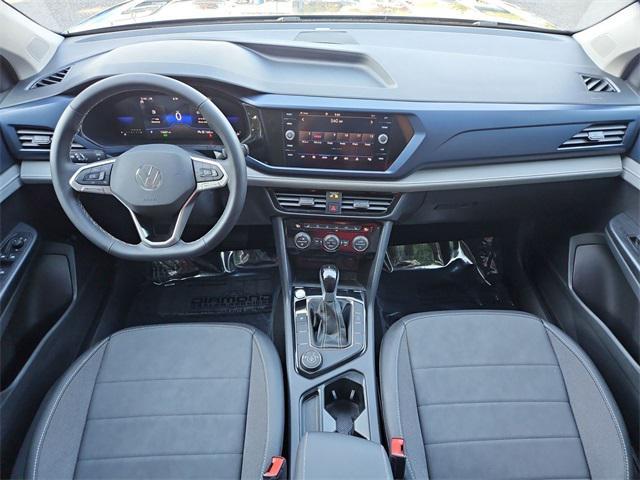 used 2024 Volkswagen Taos car, priced at $25,290
