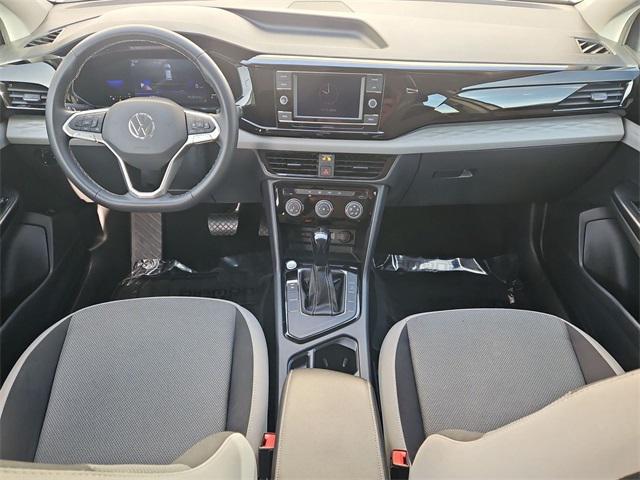 used 2023 Volkswagen Taos car, priced at $18,000