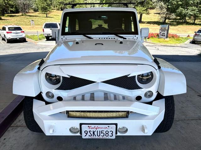 used 2016 Jeep Wrangler Unlimited car, priced at $21,998