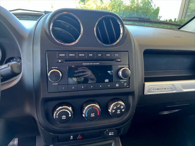 used 2015 Jeep Compass car, priced at $12,998