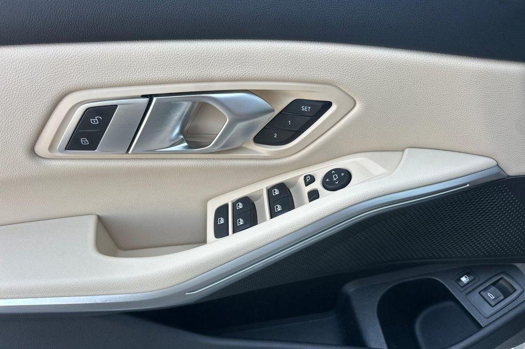 used 2023 BMW 330e car, priced at $27,039