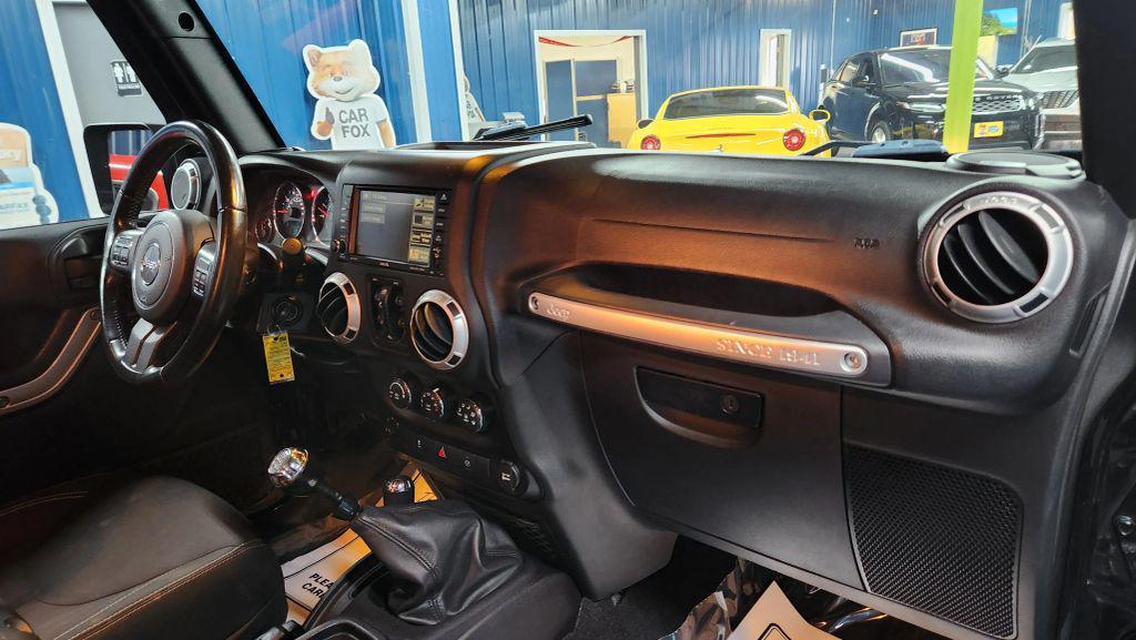 used 2015 Jeep Wrangler Unlimited car, priced at $16,931