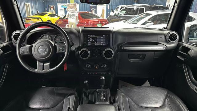 used 2015 Jeep Wrangler Unlimited car, priced at $18,333