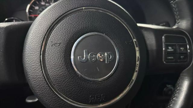 used 2015 Jeep Wrangler Unlimited car, priced at $18,333