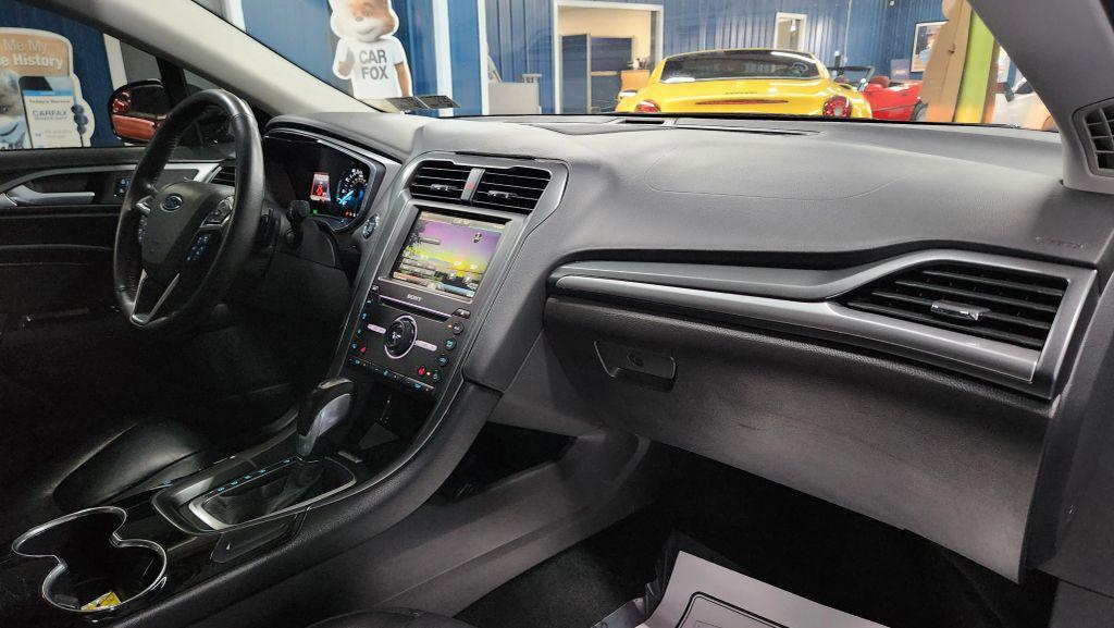 used 2016 Ford Fusion car, priced at $10,104