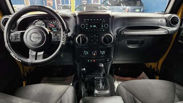 used 2015 Jeep Wrangler Unlimited car, priced at $21,970