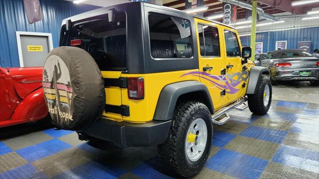 used 2015 Jeep Wrangler Unlimited car, priced at $21,970