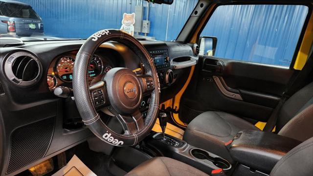 used 2015 Jeep Wrangler Unlimited car, priced at $21,970