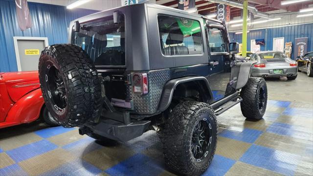 used 2013 Jeep Wrangler car, priced at $11,874