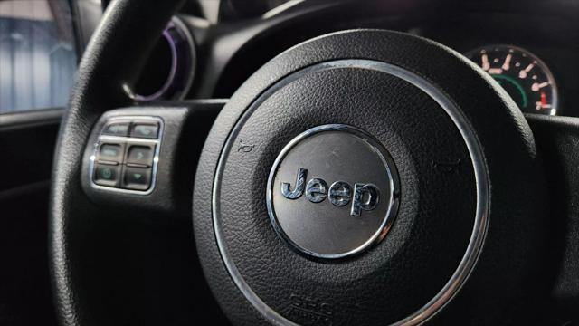 used 2013 Jeep Wrangler car, priced at $11,874