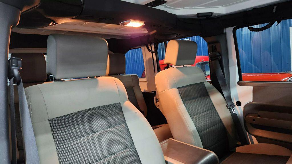 used 2010 Jeep Wrangler Unlimited car, priced at $11,455