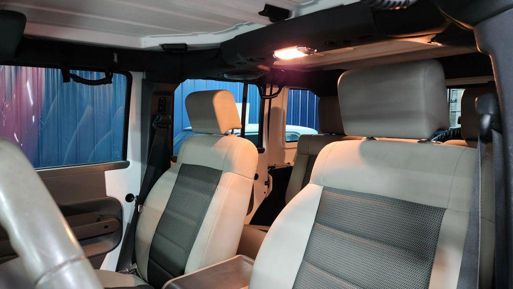 used 2010 Jeep Wrangler Unlimited car, priced at $10,875