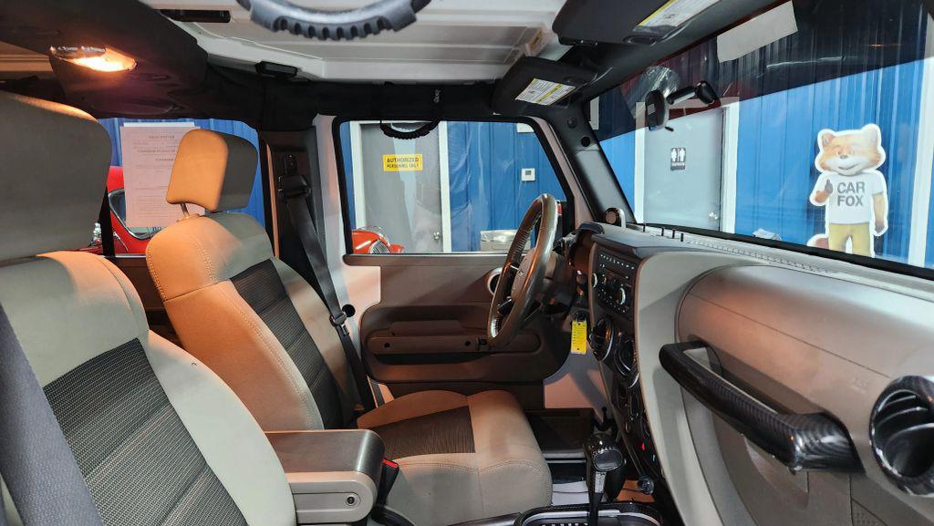 used 2010 Jeep Wrangler Unlimited car, priced at $10,875