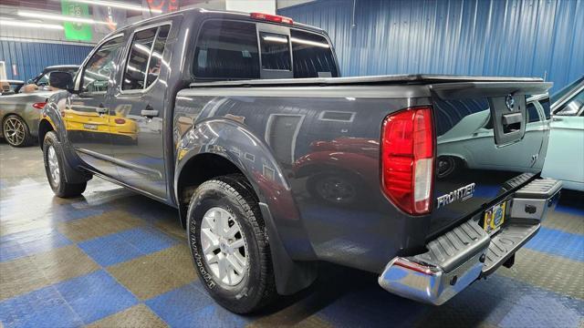 used 2015 Nissan Frontier car, priced at $16,344