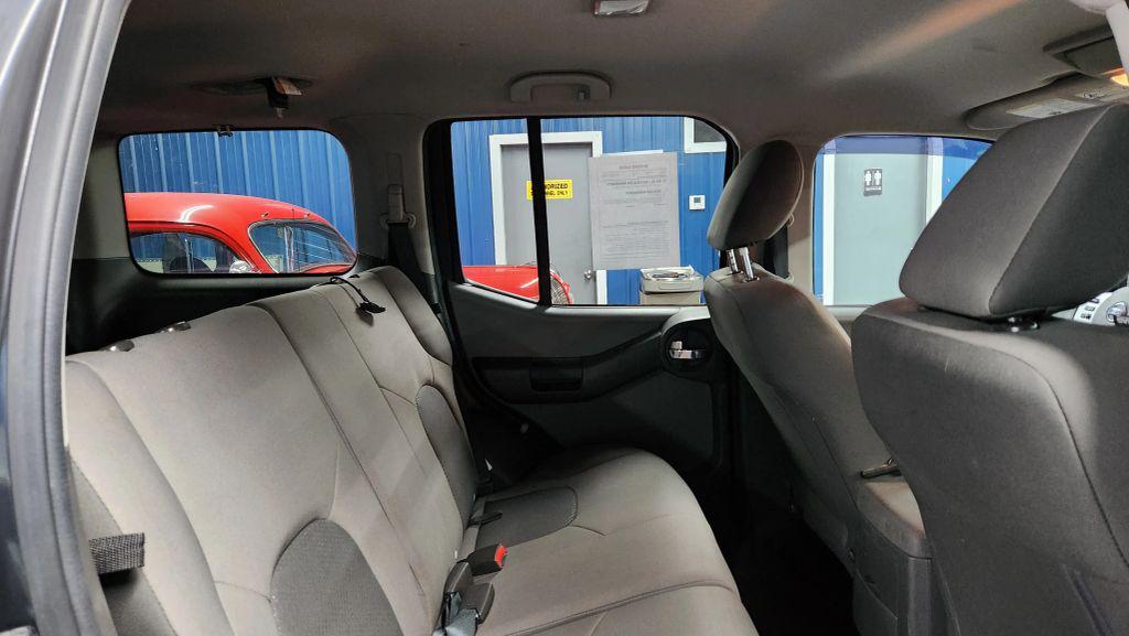 used 2015 Nissan Xterra car, priced at $11,448