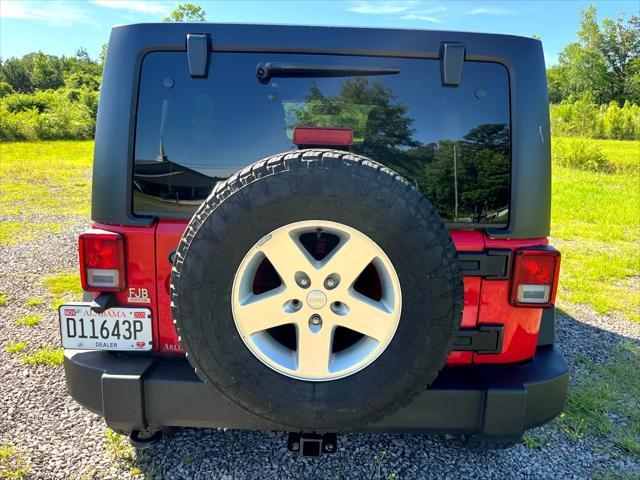 used 2015 Jeep Wrangler Unlimited car, priced at $21,450