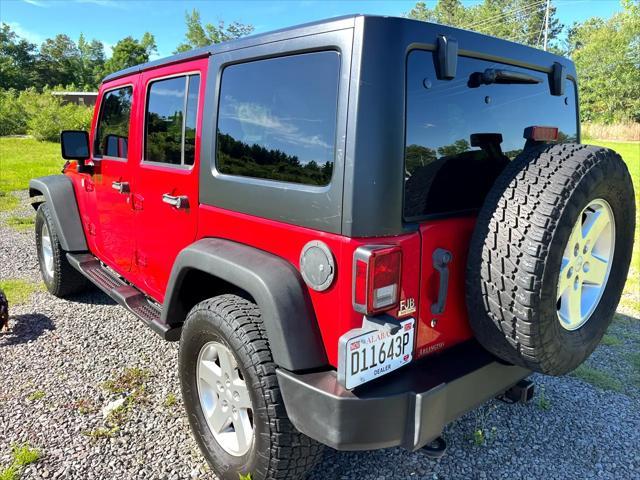 used 2015 Jeep Wrangler Unlimited car, priced at $21,450