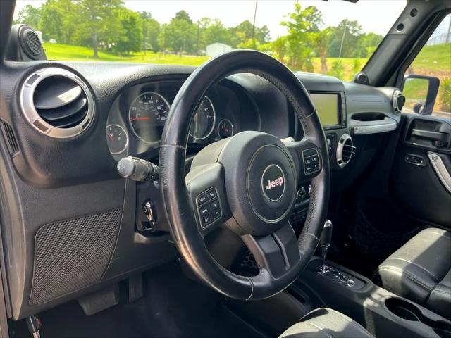 used 2012 Jeep Wrangler Unlimited car, priced at $16,995