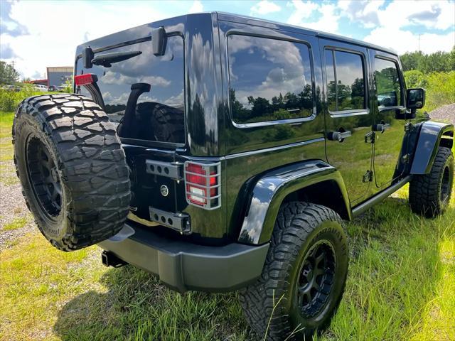used 2012 Jeep Wrangler Unlimited car, priced at $16,995