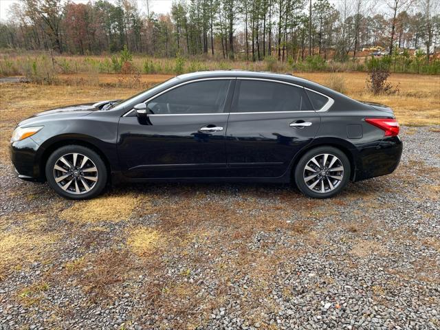 used 2016 Nissan Altima car, priced at $9,500