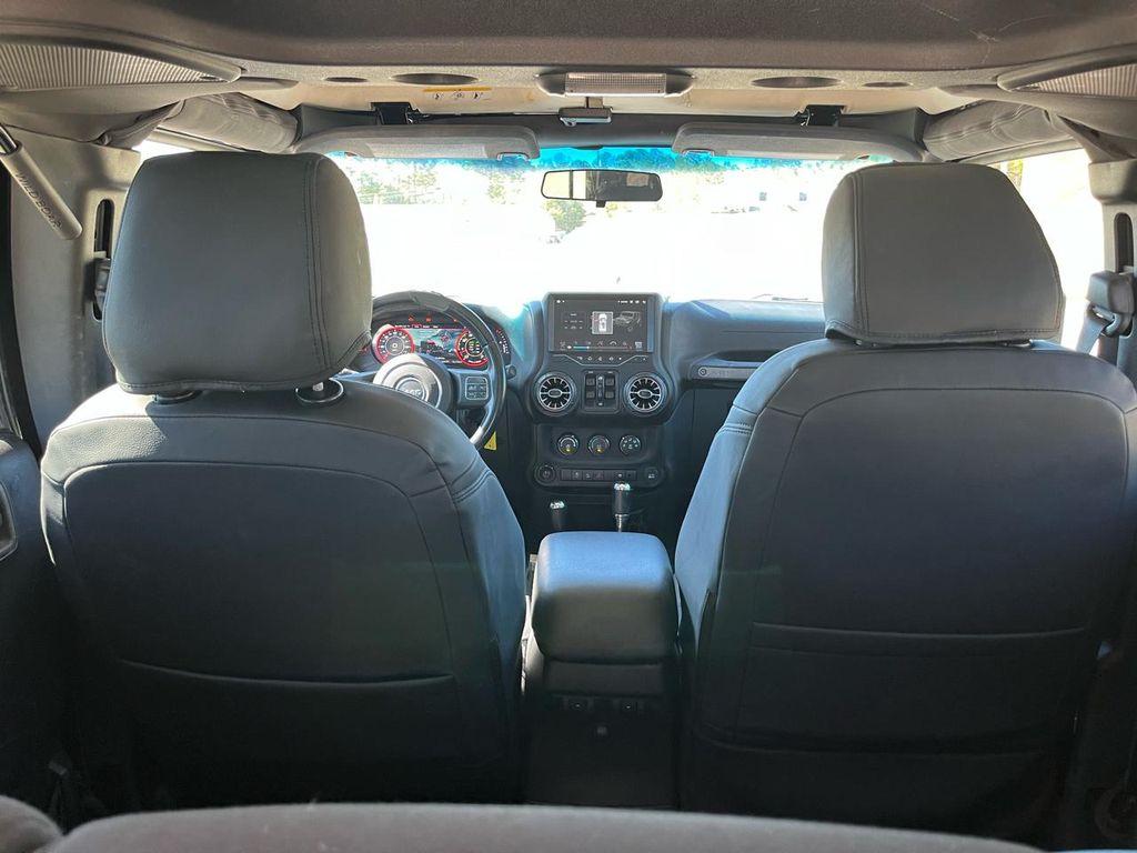 used 2015 Jeep Wrangler Unlimited car, priced at $16,340