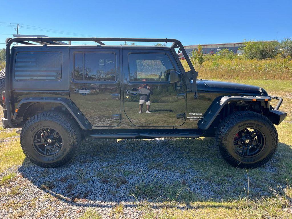 used 2015 Jeep Wrangler Unlimited car, priced at $16,340