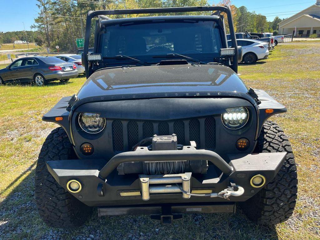 used 2015 Jeep Wrangler Unlimited car, priced at $16,340