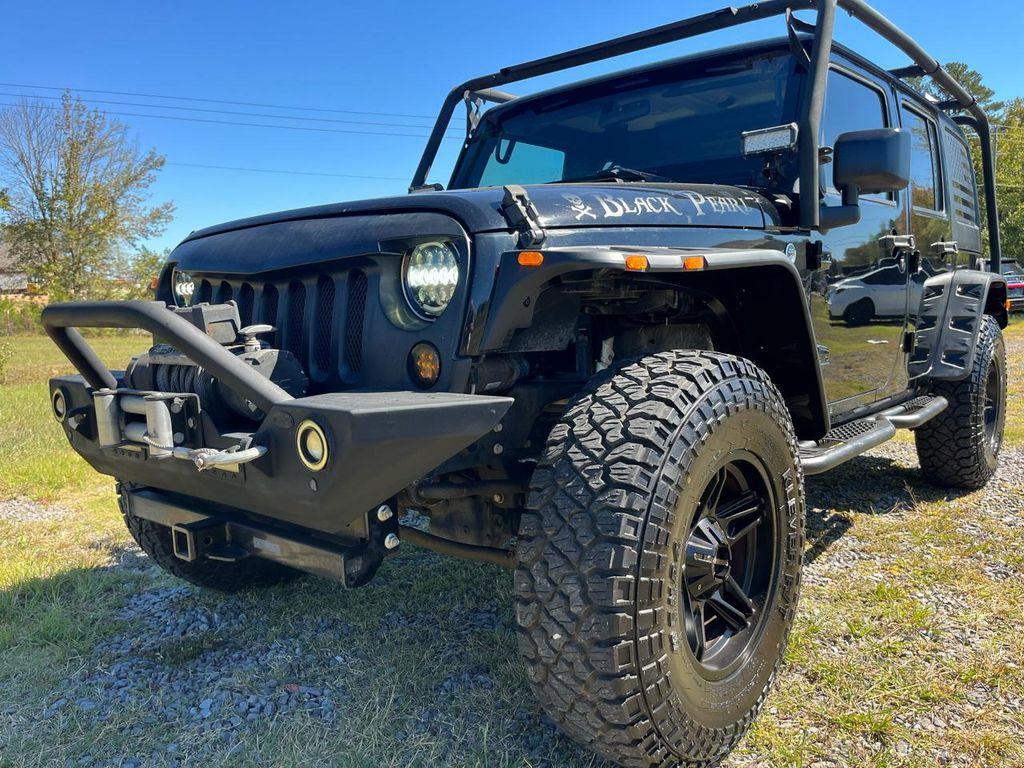 used 2015 Jeep Wrangler Unlimited car, priced at $16,340