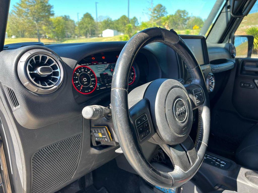 used 2015 Jeep Wrangler Unlimited car, priced at $16,340