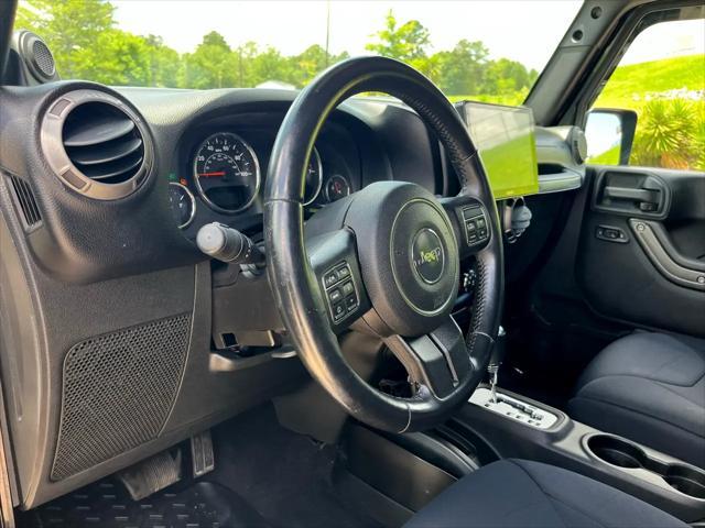 used 2014 Jeep Wrangler Unlimited car, priced at $17,675
