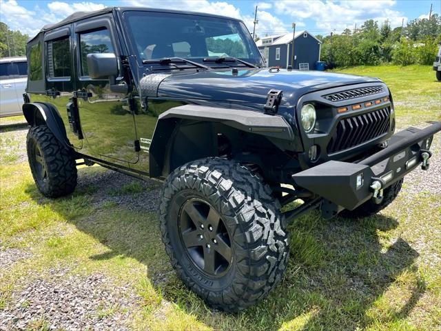 used 2014 Jeep Wrangler Unlimited car, priced at $17,675