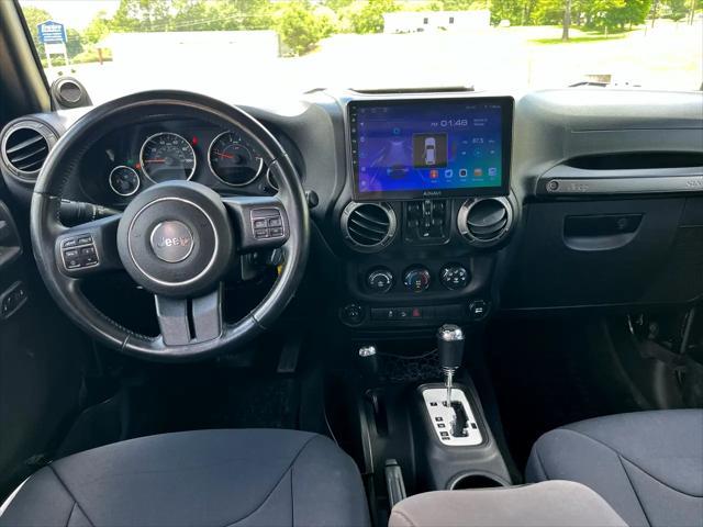 used 2014 Jeep Wrangler Unlimited car, priced at $17,675