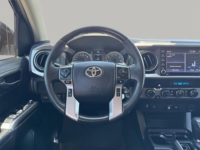 used 2021 Toyota Tacoma car, priced at $27,100