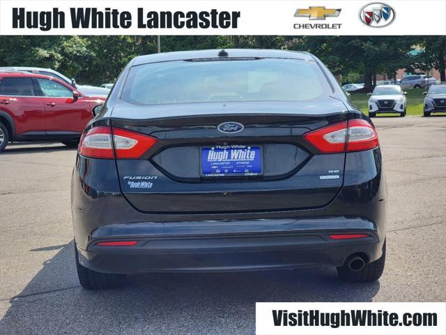 used 2014 Ford Fusion car, priced at $5,999