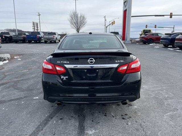 used 2017 Nissan Altima car, priced at $14,000