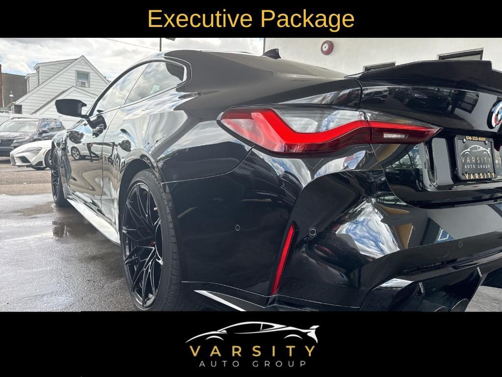 used 2021 BMW M4 car, priced at $64,999