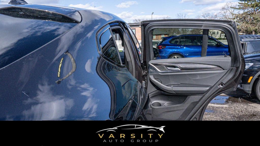 used 2023 BMW X4 car, priced at $50,407
