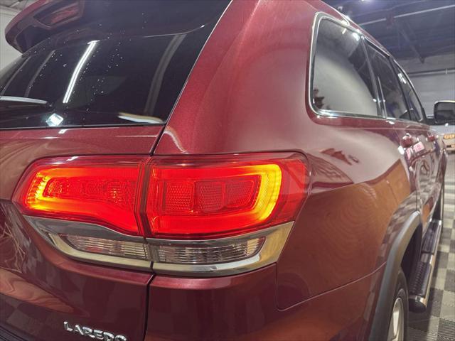 used 2014 Jeep Grand Cherokee car, priced at $10,998