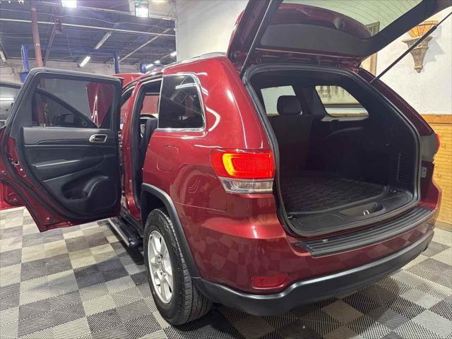 used 2014 Jeep Grand Cherokee car, priced at $10,998