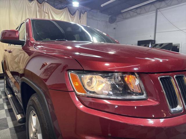 used 2014 Jeep Grand Cherokee car, priced at $10,998