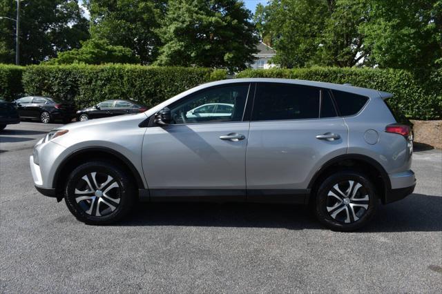 used 2018 Toyota RAV4 car, priced at $13,990