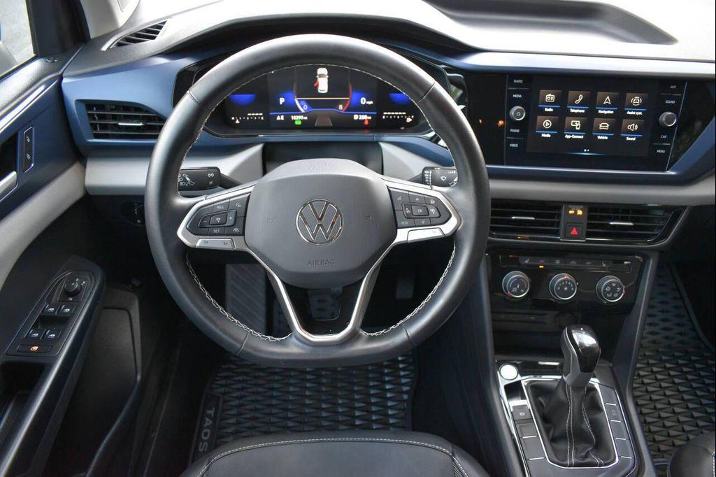 used 2023 Volkswagen Taos car, priced at $21,590