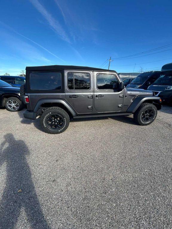 used 2021 Jeep Wrangler car, priced at $29,661
