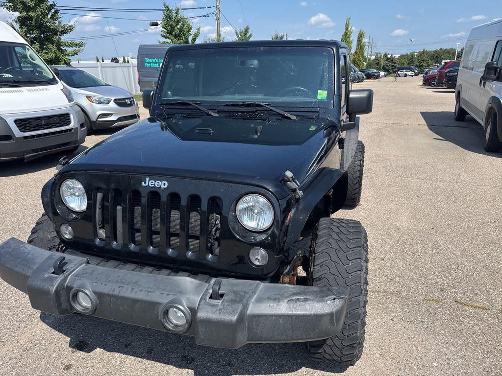 used 2014 Jeep Wrangler car, priced at $13,220