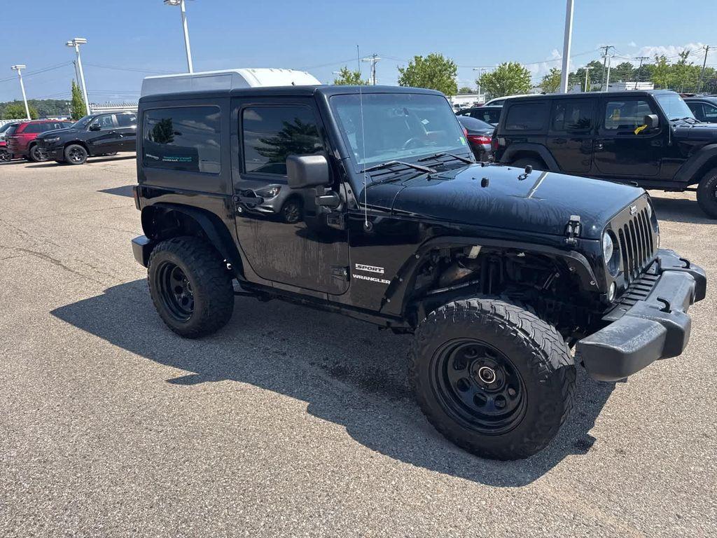 used 2014 Jeep Wrangler car, priced at $13,220