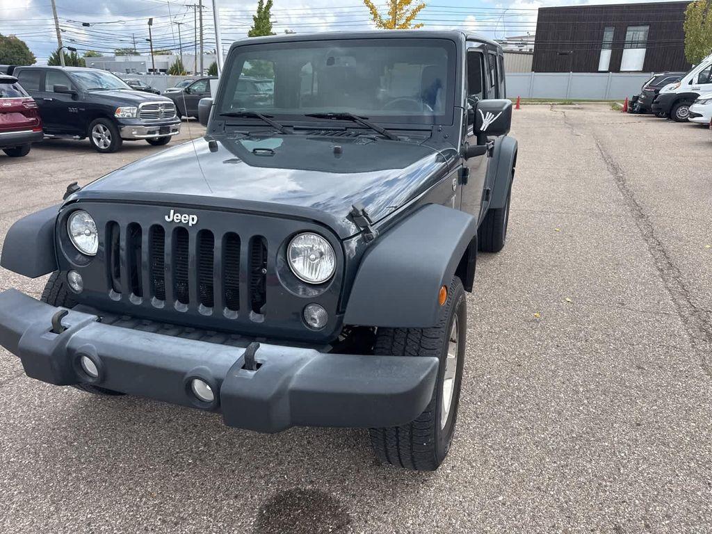 used 2017 Jeep Wrangler Unlimited car, priced at $17,681