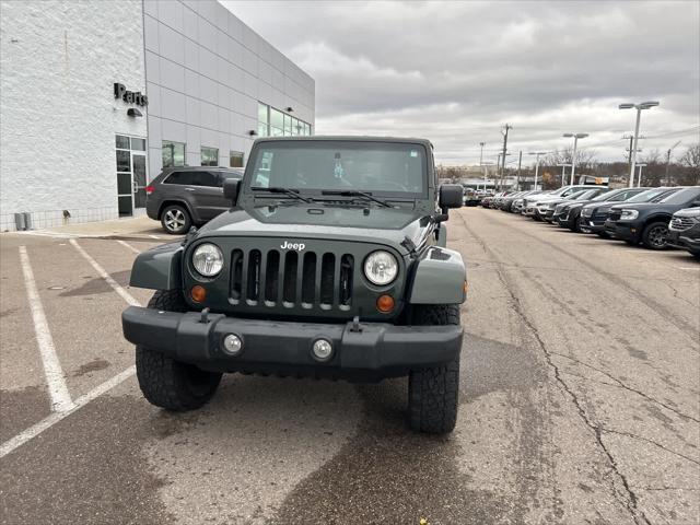 used 2010 Jeep Wrangler Unlimited car, priced at $7,987