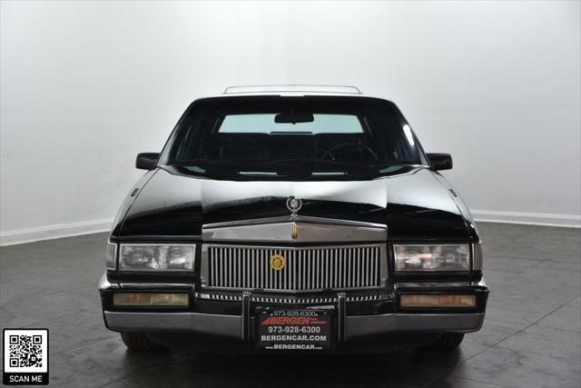 used 1990 Cadillac DeVille car, priced at $9,999