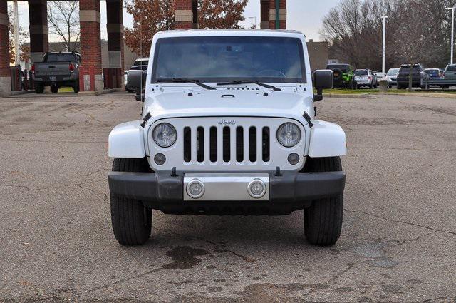 used 2015 Jeep Wrangler Unlimited car, priced at $19,302