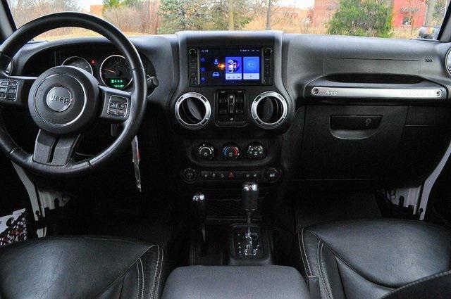 used 2015 Jeep Wrangler Unlimited car, priced at $19,302